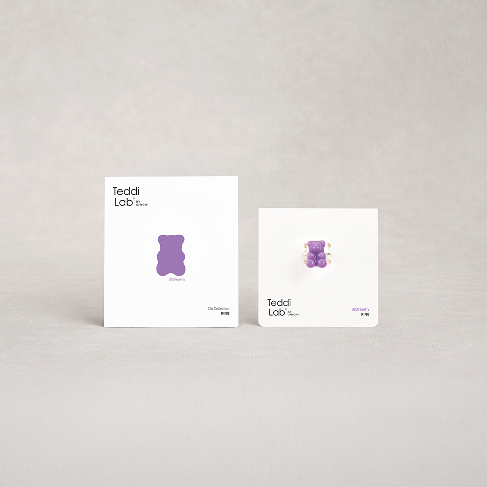 Two white boxes with purple teddy bear graphics and 'Teddi Lab' text on a light gray background